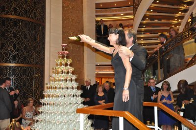 Evelyn pouring champagne.... alot of it.