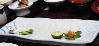 Fugu sashimi and Fugu-chiri with sudachi, sliced soo thin you could barely see the fish 038.jpg