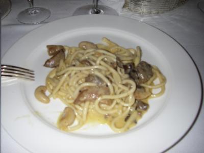 Pici pasta with creste di gilli (cockscomb), livers, cocks stones (rooster balls), and black truffles  0140