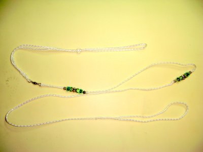 Lead 4-White Ird. cord with Green and Silver beads