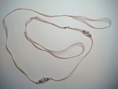 Lead 17-Gold and white cord with glass bead and purple accents