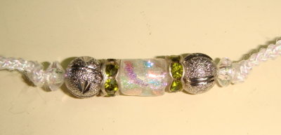 Lead 2 detail Ird. glass bead with Olive green rondells and silver accents