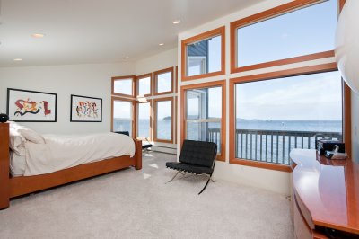 Upstairs master bedroom, deck and view