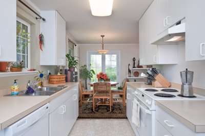 Kitchen and dining area in back