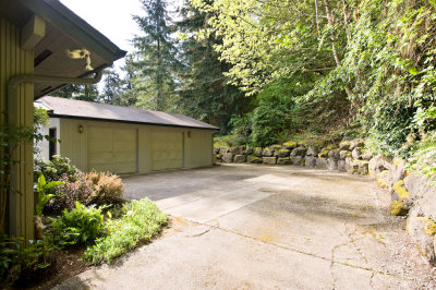 Driveway leading to the garage in back