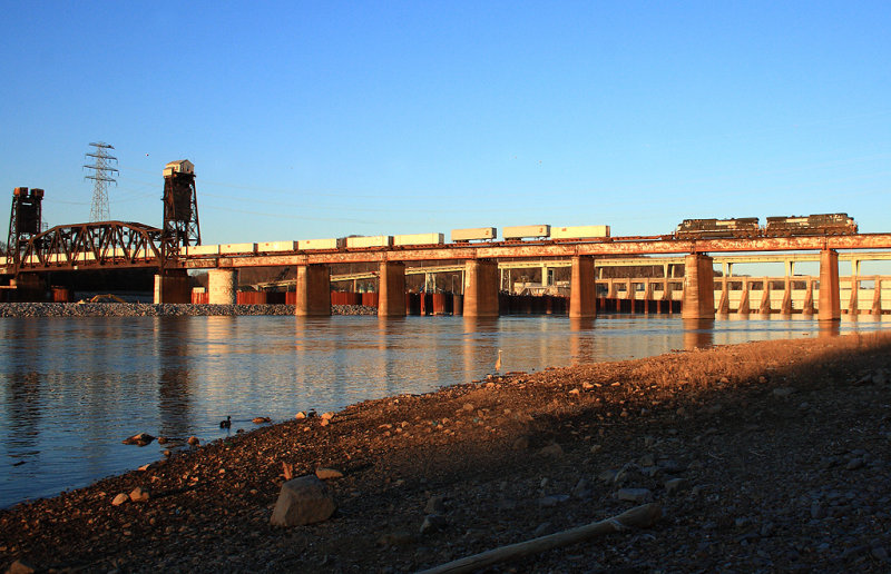 A late 229 crosses the TN river in the last rays of light   