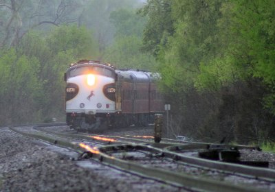 The 955 sits in the Talmage siding in a down pour 