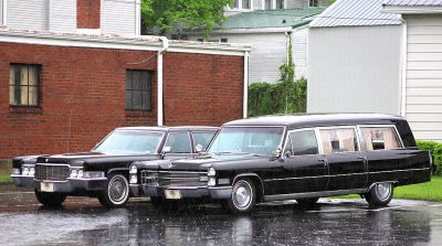 Alexander and Royalty Funeral Home hearse and limo 