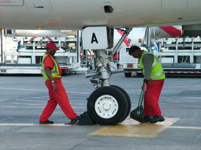 1553 17th Jan 06 Chocks on A6-ABA Sharjah Airport.JPG