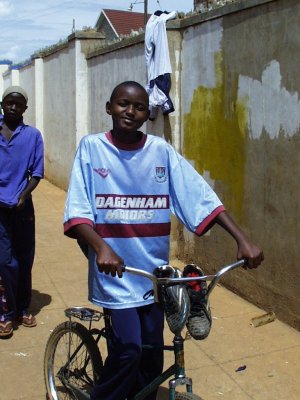 Kid on bike Kampala Uganda