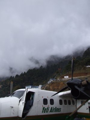Yeti Airlines Twin Otter under the clouds at Lukla Nepal.JPG
