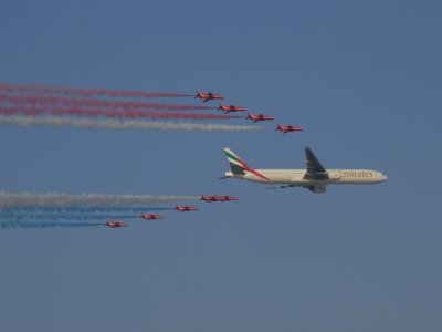 Emirates 777 with the Red Arrows Dubai Air Show 2007.JPG