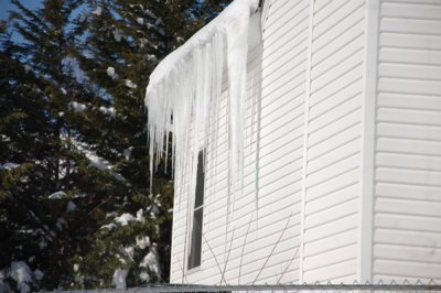 Ice hanging from the house.  Gerald cleared them off the night before and this is what grew back
