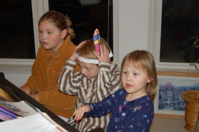 Back to the piano, Lalena tried to actually play something with Rory's help