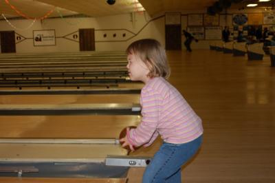 Rory has great form but she might want to work on keeping her eyes open when she lines the ball up