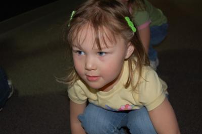 Rory leaping through the frog exhibit
