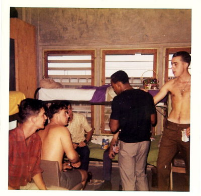 53-Jim Leko in red shirt, Ed Ivey sitting on bunk, & Dennis Reichmuth standing with no shirt