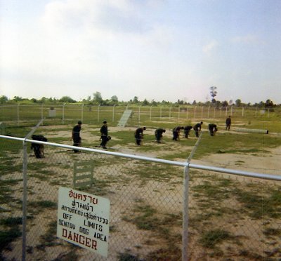 Long shot of training exercises at U-Tapao, probably before the first guardmount.  Far side is  Trainer SSgt. Dale Weaverling.