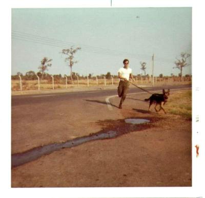 Guy running with his dog - Udorn 71