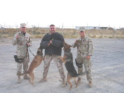 SSgt Mooney and MWD Luca TSgt Somers and SrA Kaun with MWD Argo