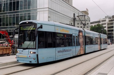 Kk 11-es villamos a Willy-Brandt-Platz-nl - Blue tram 11 at Willy-Brandt-Platz.jpg