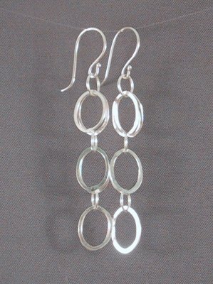 Sterling 5 cm long earrings with double ovals at each joint. Very light weight
