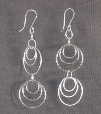 Sterling 5.5 cm long earrings with 2 sets of three concentric circles each