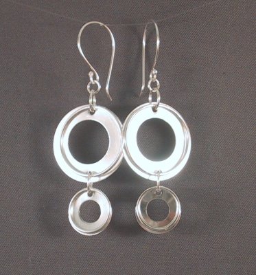Sterling 4cm long earrings with hoops over the discs.