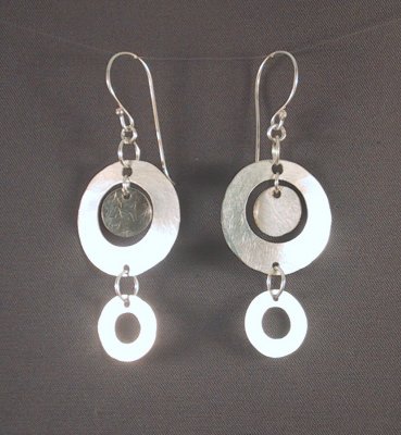 Sterling earrings with multiple hammered discs - 4 cm long.