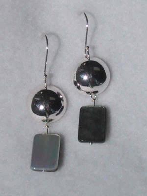 the mother-of-pearl (MOP) beads are irridescent white on one side and black on the other