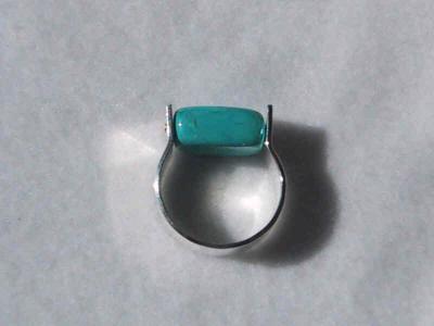 side view of the turquoise horse-shoe style ring