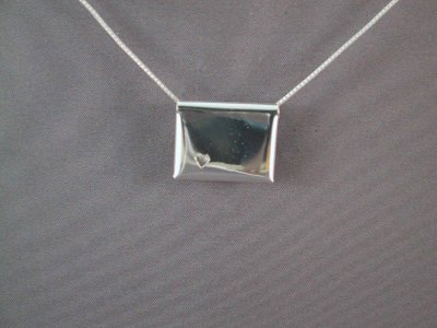 Front view of envelope pendant