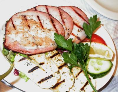 Grilled dead pig, lemon cuts, poison ivy sprigs & squeeky cheese (halloumi).