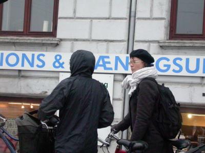 Bikers discussing important issues while waiting for light to change