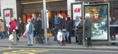Watching for the bus at H&M