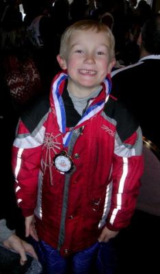 Luke with 4th place medal