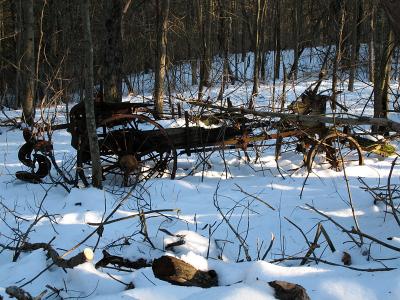 An old abandoned manure spreader