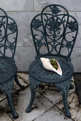 seashell and cast iron chair