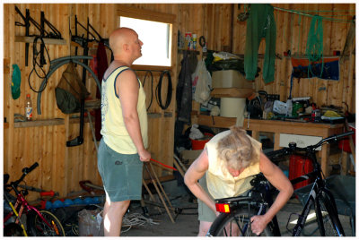 My wife and my brother fixing bikes