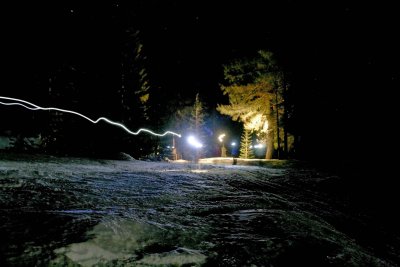 Sled Team Streaks By  At Trinity Checkpoint ( 10 Second Timed Exposure )