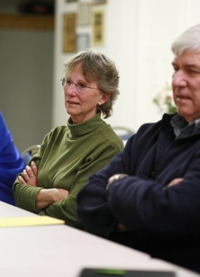 Mrs. Don Olin And Wayne Long Listern  At Meeting