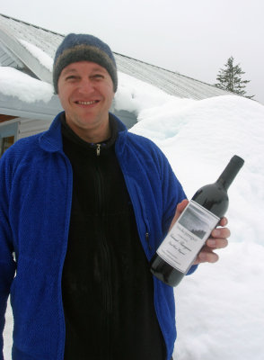 Race Vet Ty Johnson WIth A Bottle Of His Homemade Wine