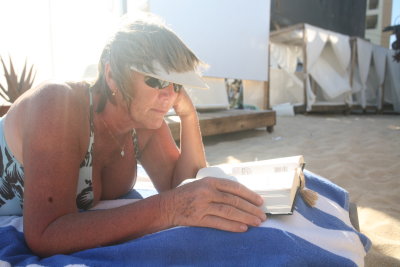 Cabo Local , Colorado Transplant Patty Enjoying Book On The Beach