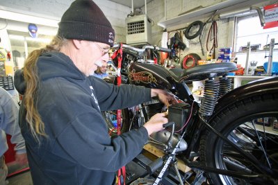 Vintage Bike Mechanic Jay Working On 250cc Harley