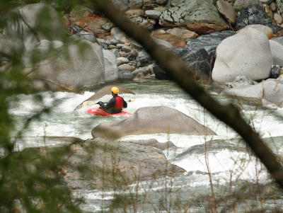 Kayaker At Head of Rapids 