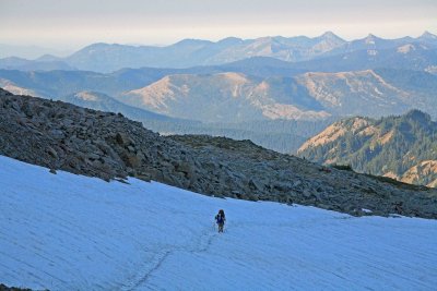 Hikers Crossing Large Snowfield Near Old Snowy On PCT