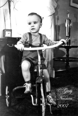 Gary w first tricycle.