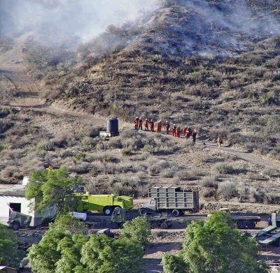 Fireman Holding The Line