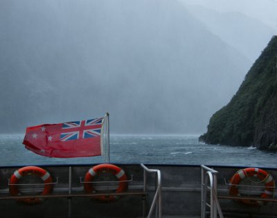 NZ flag and buoys Milford Sound