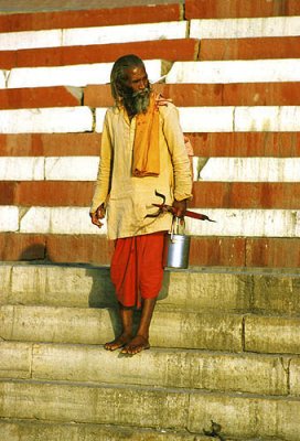 Pilgrim on the steps of a Ghat, Varanasi